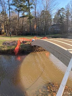 Photo of construction of arch bridge.